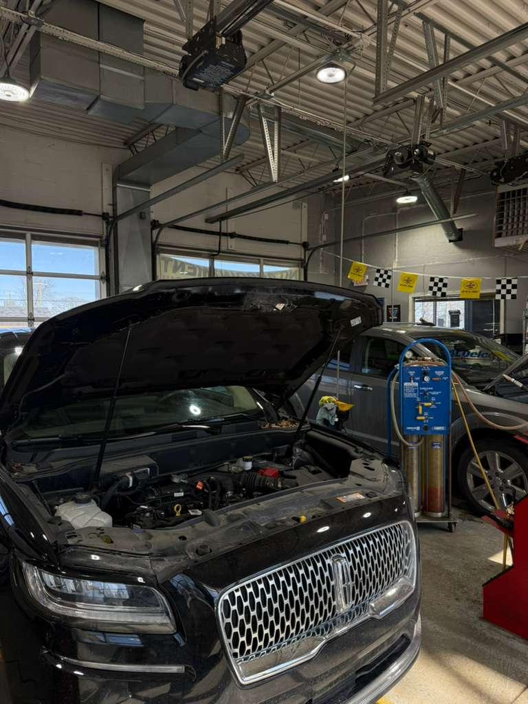 Speedy Auto Repair shop — full service bay in Eastpointe, MI